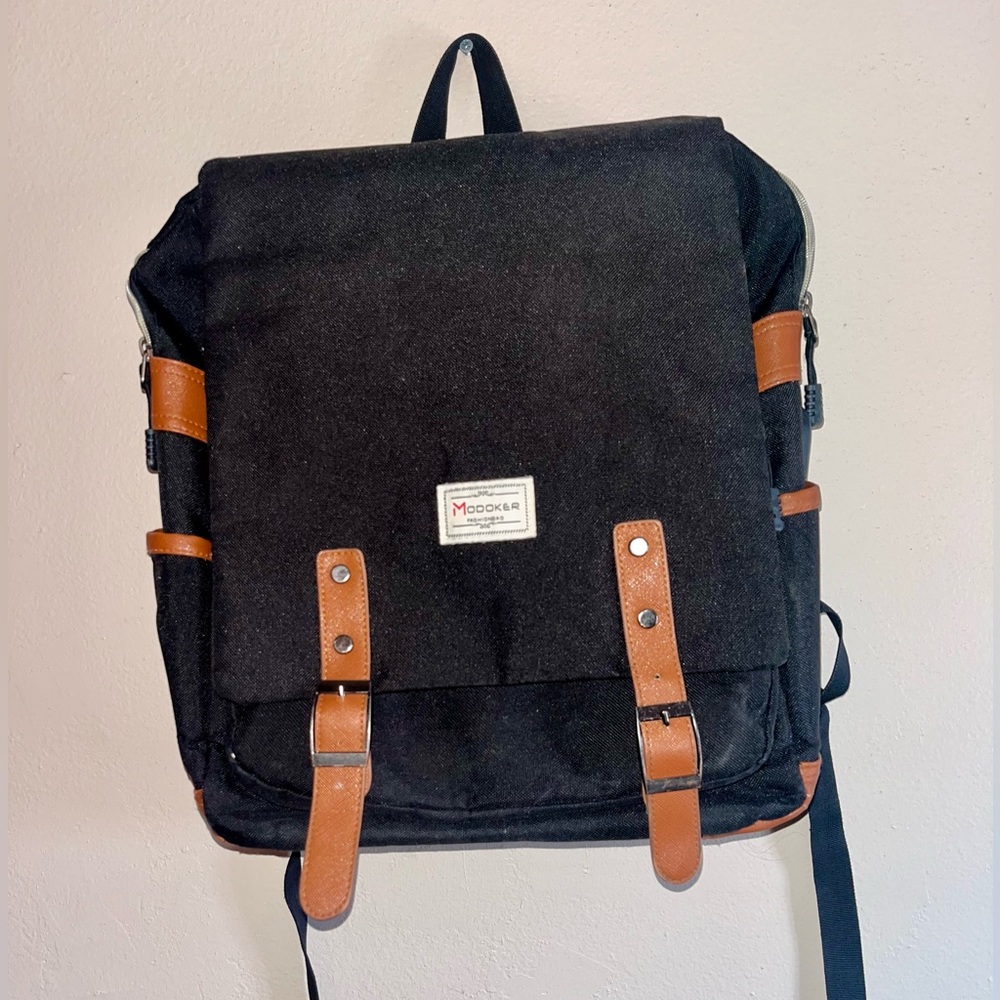 Black and brown-leather backpack, Charging port, laptop compartment, cup pockets